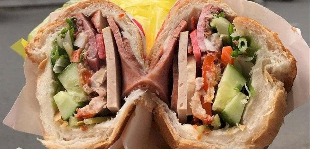Banh mi 59 is known for its unique blend of meats, including cold cuts, grilled pork, and p&acirc;t&eacute;